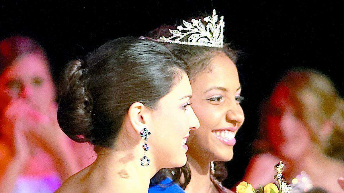 Miss Fort Mill High 2009 Ceci Kryst (middle) is congratulated by first runner-up Lauren Deas (left) and Miss Senior Taylor Hoverman.
