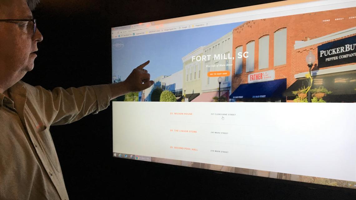 Roots and Recall volunteer Greg Tennant gives a demonstration last week of This Building Has History, a newly launched interactive web program for touring Fort Mill's historic district.
