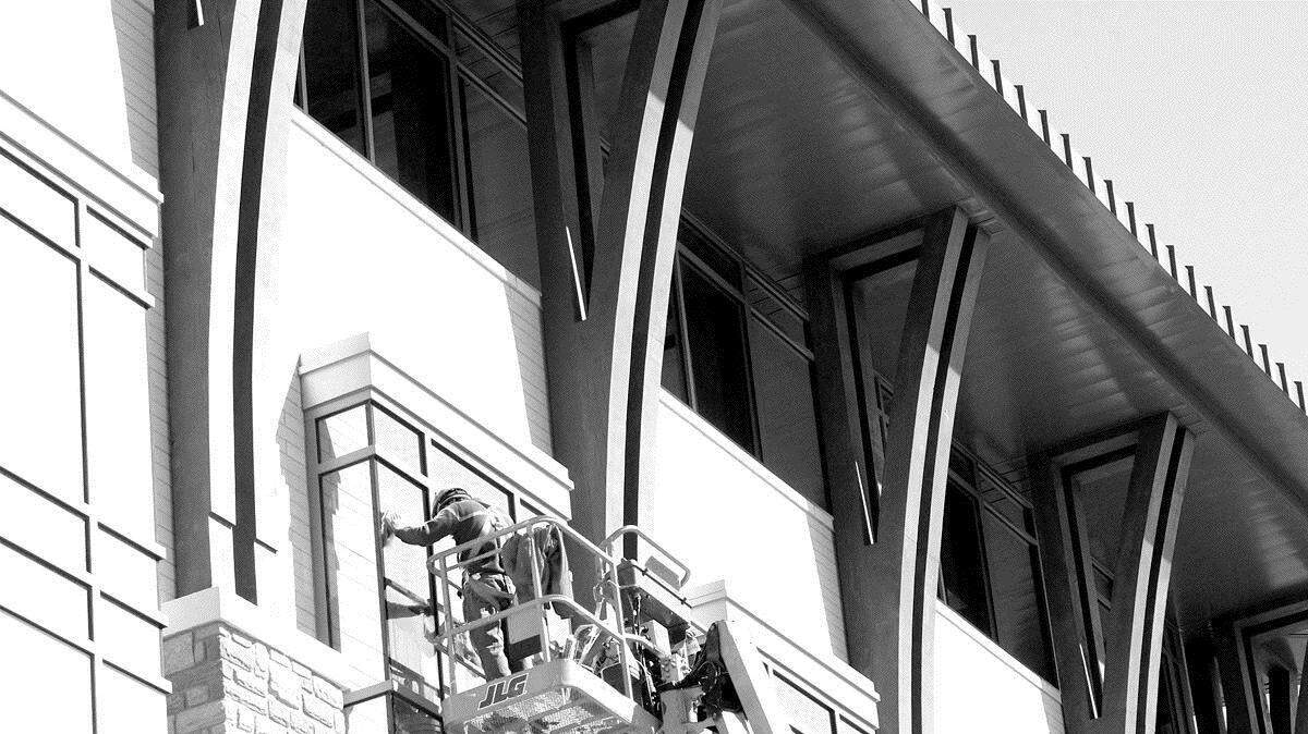 Window washers polish the new WorldReach Center to a high shine. The WorldReach Center is Inspiration Networks' new headquarters, located at the City of Light campus in Indian Land. When complete, the 93-acre site will include production facilities, a prayer house and a women's center.