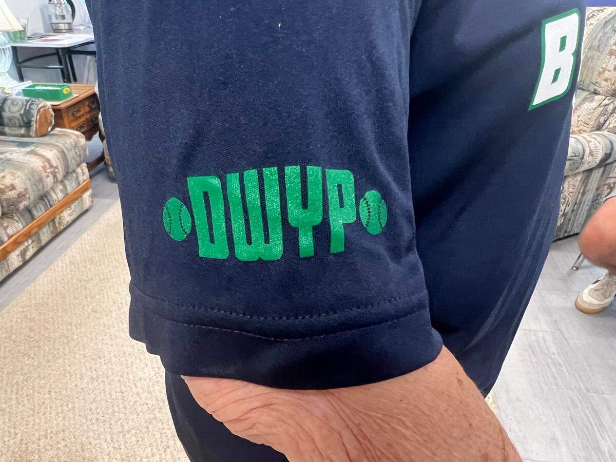 A shirt with “D.W.Y.P” or “Don’t Waste Your Presence”--a mantra that Jalen Benjamin echoed a lot to his players.