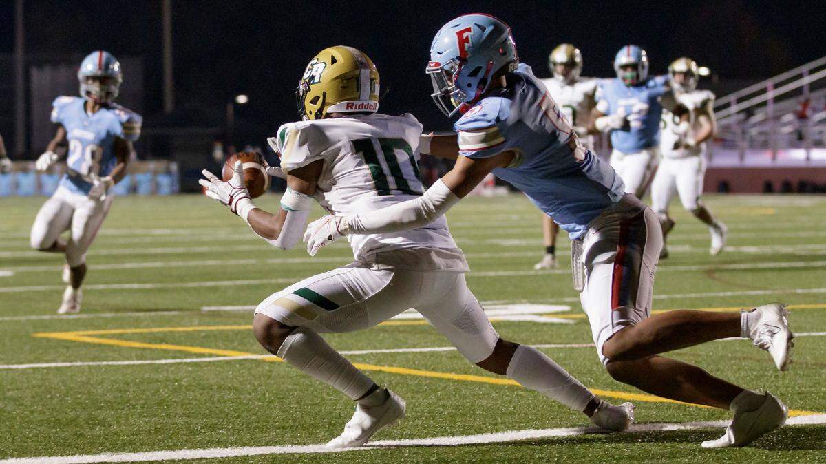 Catawba Ridge’s #10 Jacobie Henderson makes the catch and scores a second touchdown to bring the Copperheads within a touchdown in first half play as AC Flora hosts Catawba Ridge in a semifinal matchup of the 2020 SCHSL Football State Championships. 11-27-2020.