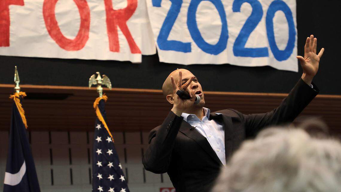 Presidential hopeful Cory Booker addresses a crowd at a campaign stop at Freedom Temple Ministries Saturday.