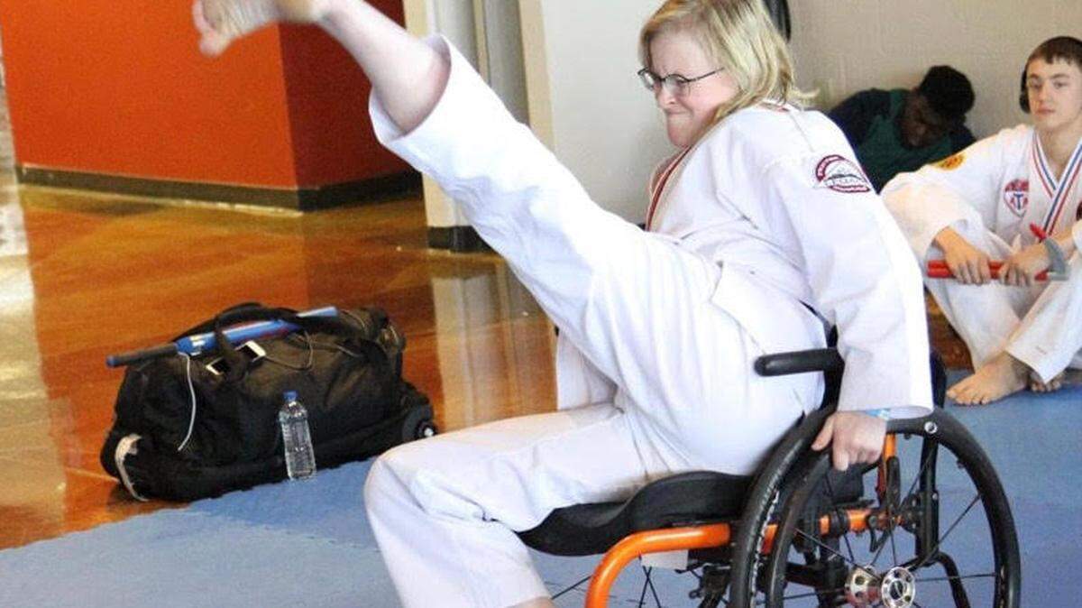 Bayer is a nine-time world champion in martial arts, competing from a wheelchair.