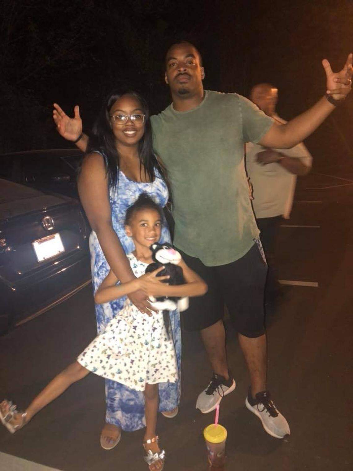 Breelyn, DeVonte and DeVonte’s daughter, Brooklyn, pose for a picture. DeVonte said his sister loved being an aunt to his daughter.