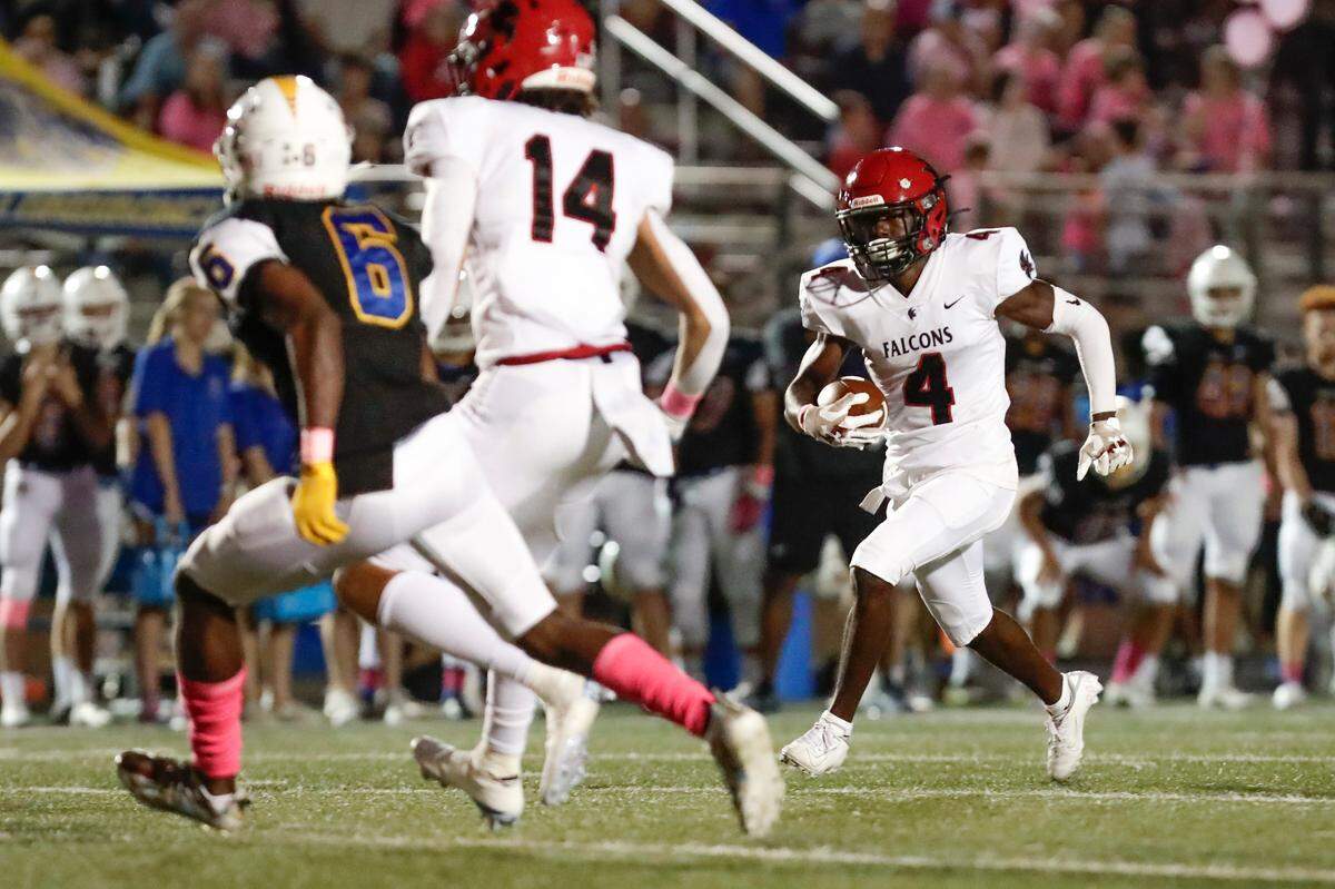 Nation Ford’s (4) Jerrick Foster breaks free in first half play as Fort Mill hosts Nation Ford in a cross town football rivalry Friday, October 1, 2021. Nation Ford plays Boiling Springs on Friday night.