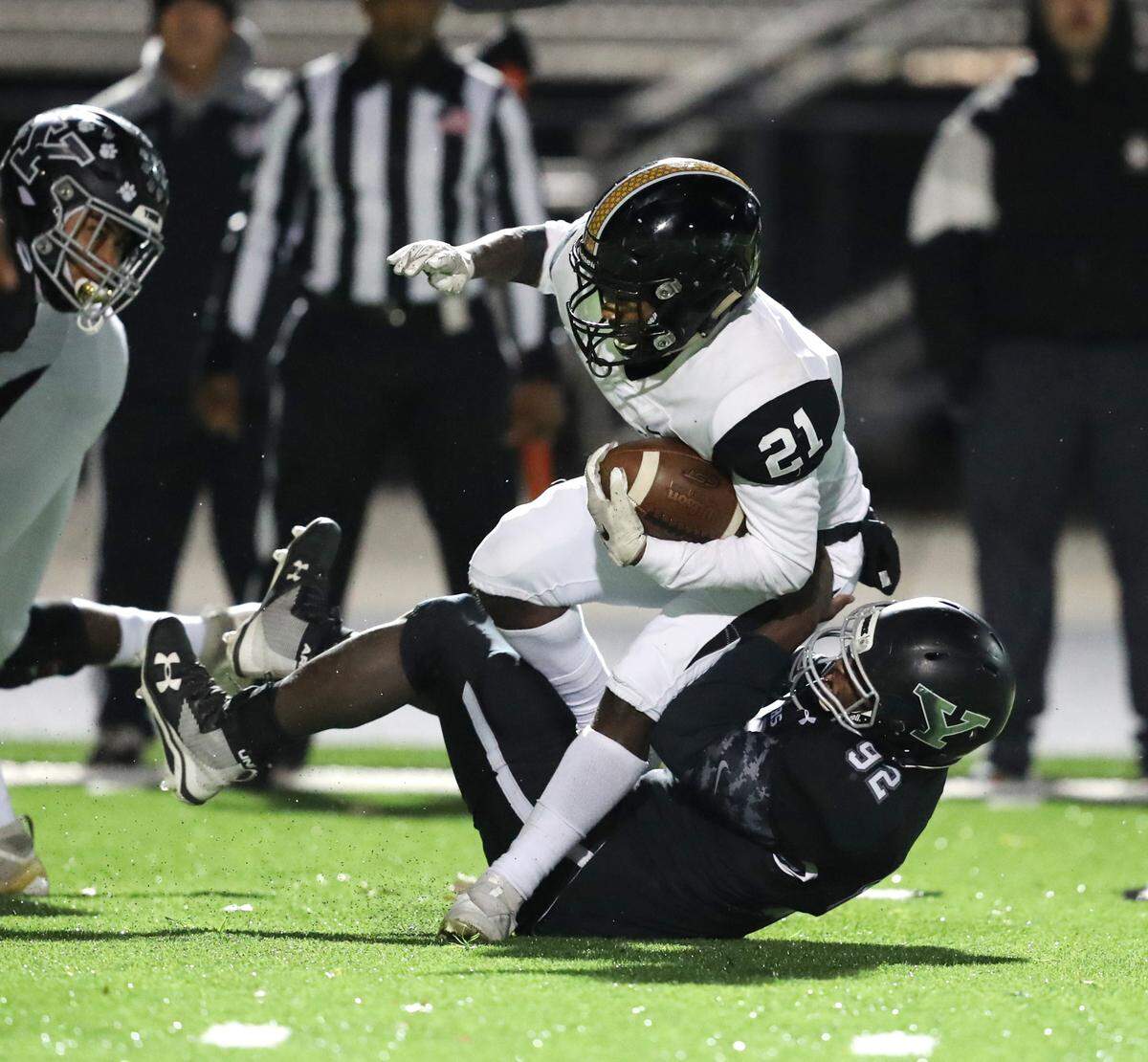 York Comprehensive High School hosted Irmo in the first round of the state playoffs November 5, 2021. Irmo’s Larontae Scroggins is taken down by York’s Tyheem Williams. Andy Burriss-Special to The Herald