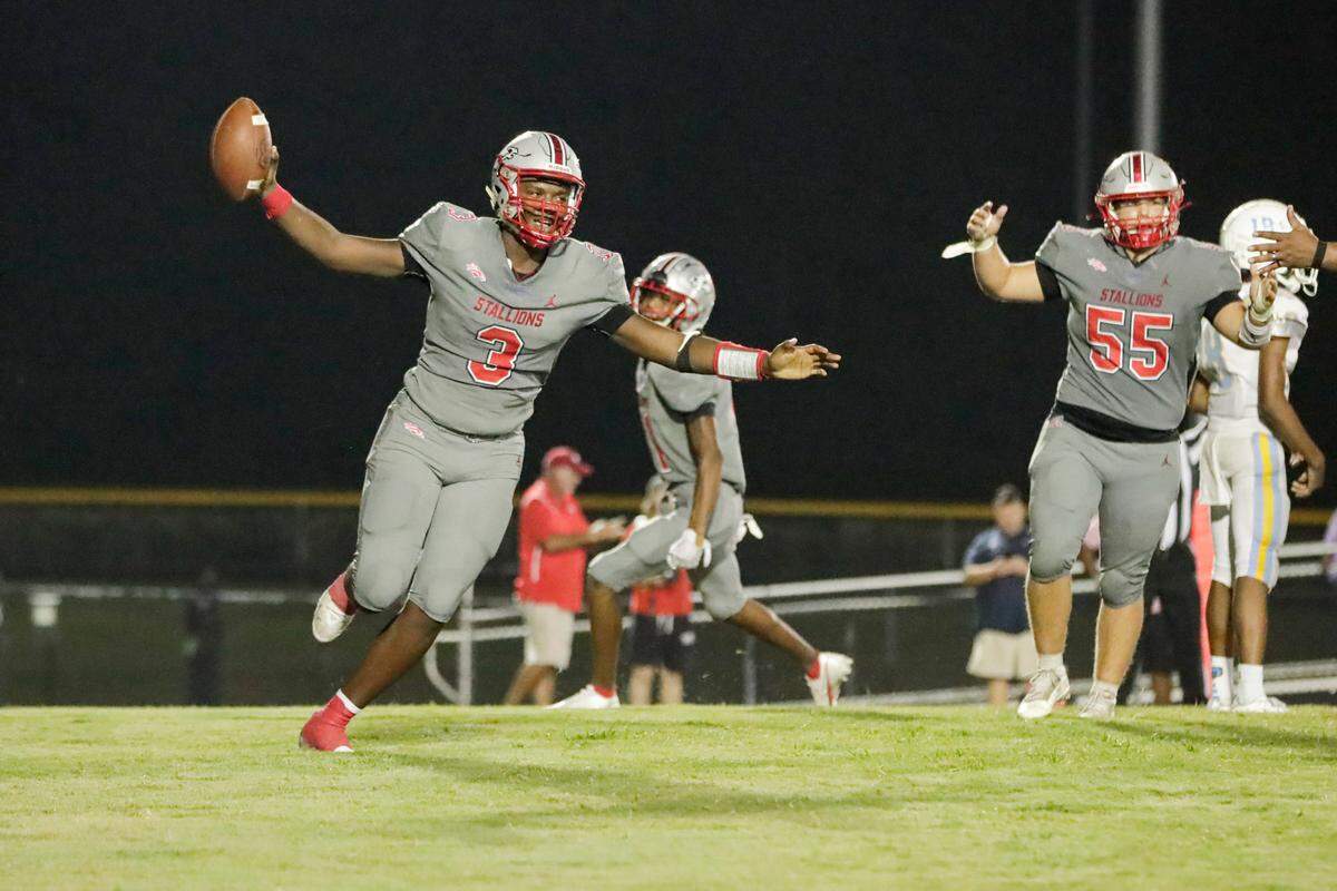 South Pointe quarterback (3) Zay McCrorey scores in second overtime as the South Pointe Stallions host the South Florence Bruins in Friday night football action, 9-17-2021. McCrorey and the Stallions will face RNE in the first round of the state playoffs on Friday (Nov. 5).