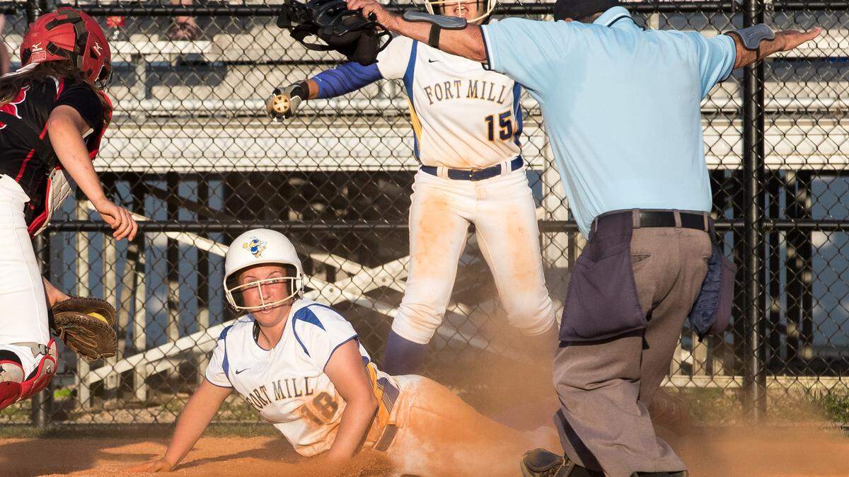 Marissa McDermott (18) of Fort Mill, slides safe into home plate to score the go ahead run as Fort Mill defeats Boiling Springs 5-2 in a SCHSL Upper State 5A softball semifinal game Wednesday, May 9, 2018.