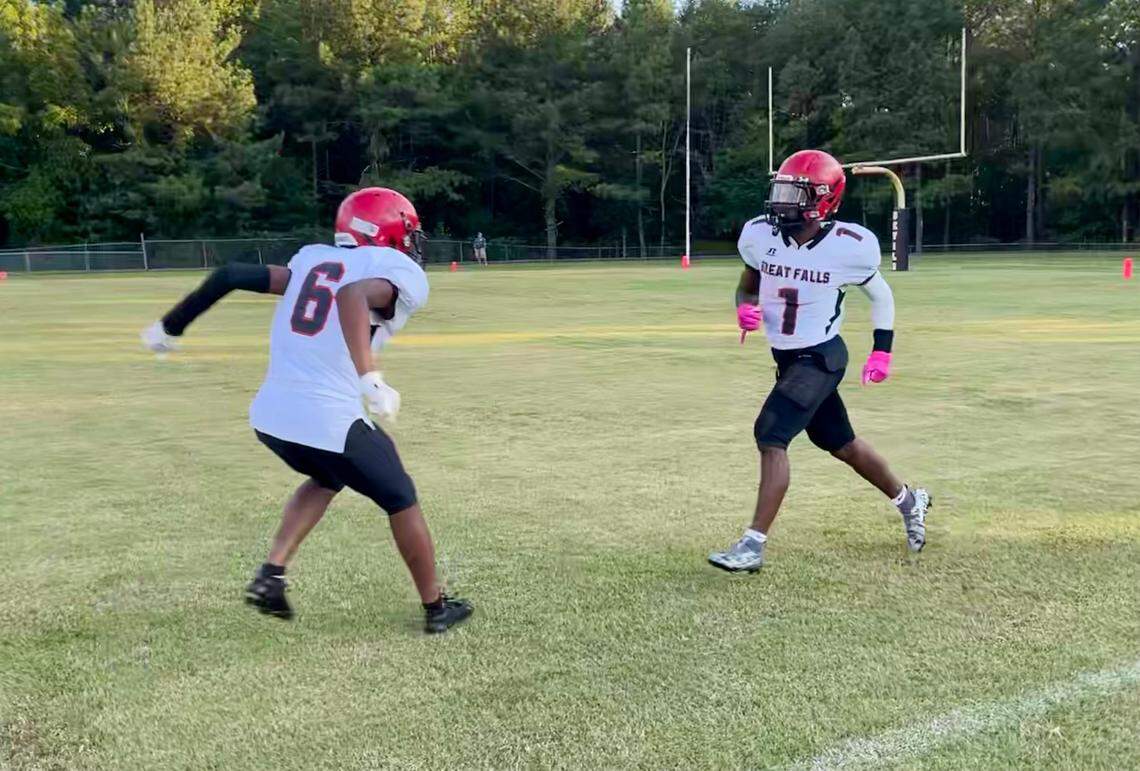 Rico McCollough (#6) celebrates with Foxx Moore (#1), who broke open for a 40-plus yard score at a recent scrimmage at Buford.