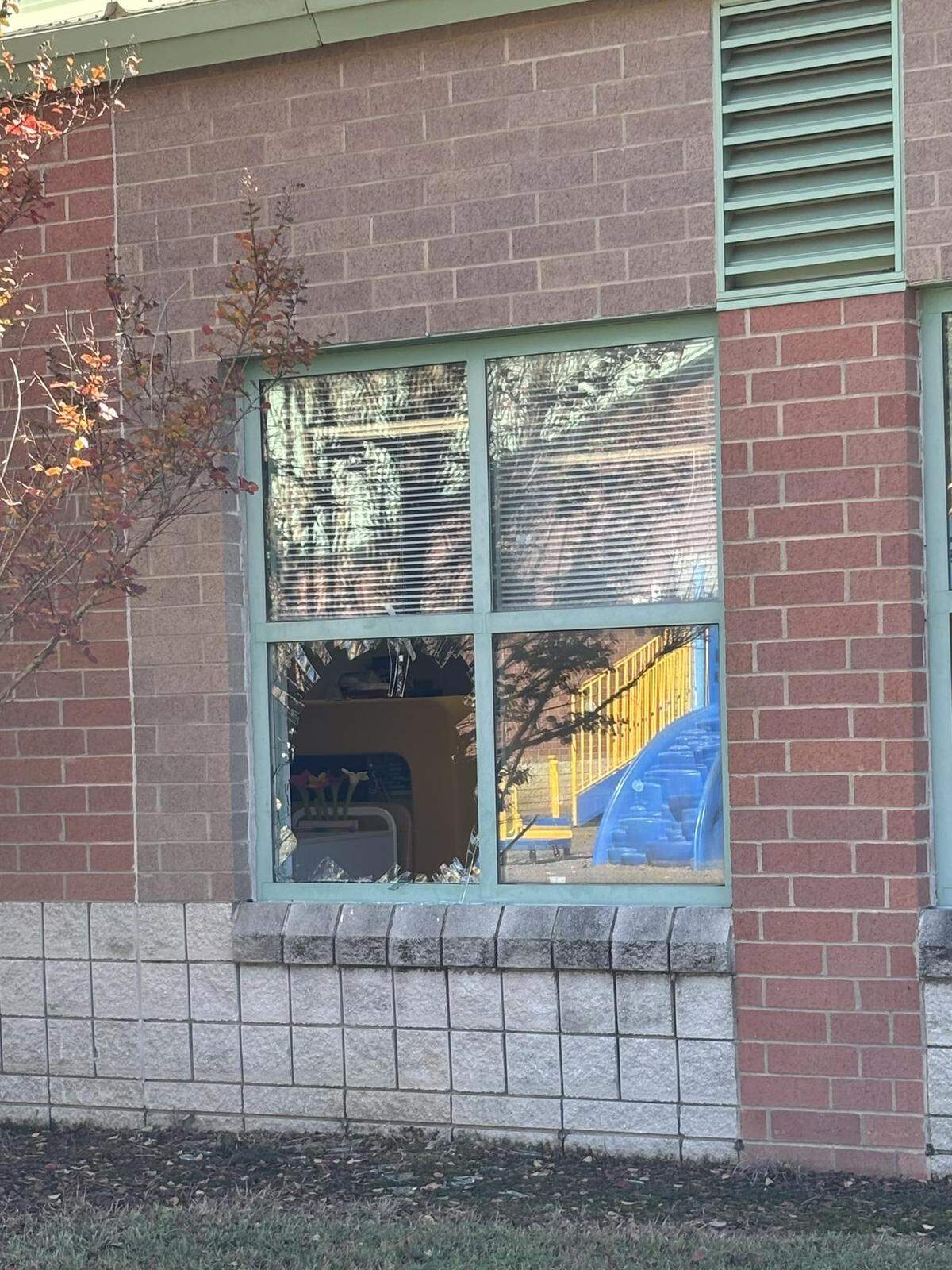 The window a suspect broke at a Chester County, South Carolina, school. The suspect kidnapped a child inside before he was caught outside the school after leaving with the child through the window, Chester County Sheriff Max Dorsey said.