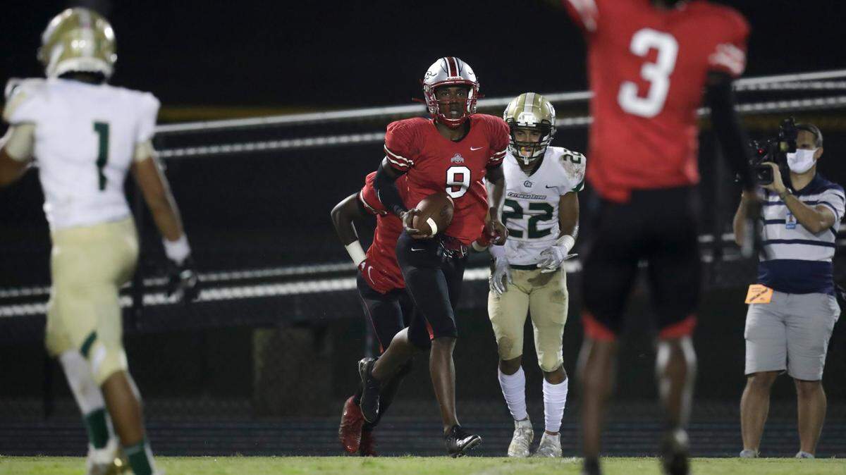 South Pointe’s O’Mega Blake breaks a big gain to set up a South Pointe touchdown in early play as South Pointe hosts Catawba Ridge in Friday night varsity football.