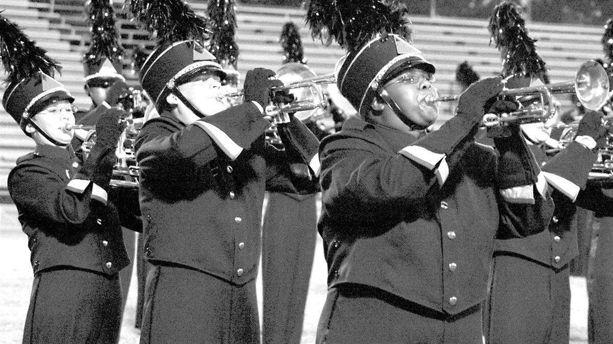 In 1998, Sean Carney was hired at Fort Mill High School to fill a new position, assistant band director, to help band director Martin Dickey.