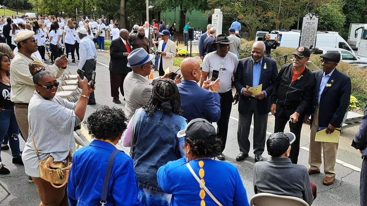 In this file photo, former George Fish School students take photos with former school staff members during a 2022 historical marker dedication for the school that served Black students in Fort Mill prior to school integration. A new early childhood learning center in Fort Mill also will have the George Fish name.