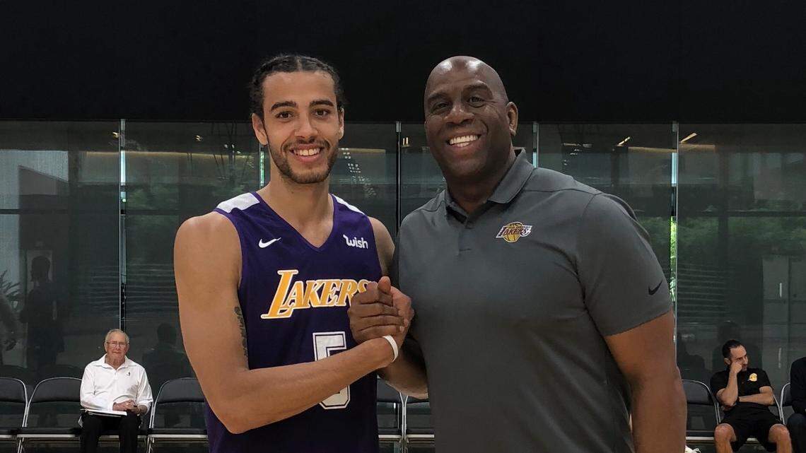 Former Winthrop basketball star Xavier Cooks is busy working out for NBA teams, and, on occasion, taking photos with NBA celebrities, like Los Angeles Lakers president of basketball operations and Hall of Famer Magic Johnson.