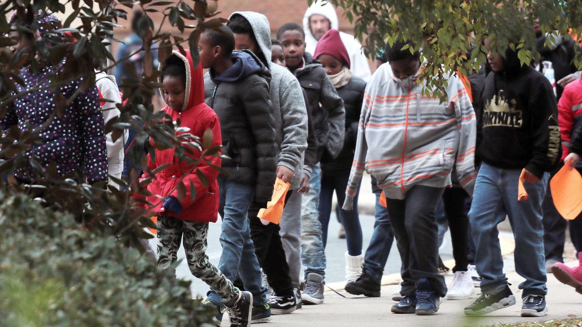 Children bundle up as they tour Winthrop University Thursday.