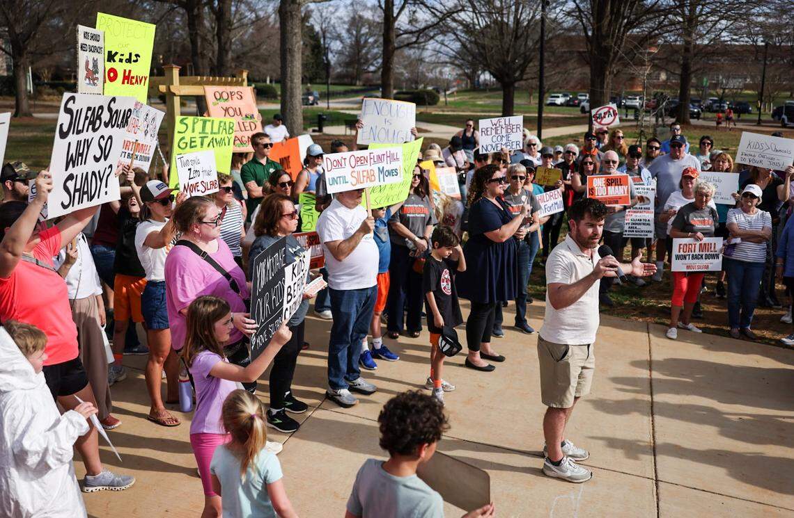 People gather at Walter Elisha Park in Fort Mill to protest Silfab Solar on Friday.