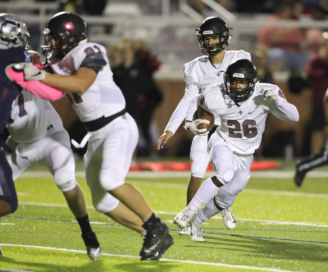 Clover hosted Rock Hill October 12, 2018. Rock Hill’s Narii Gaither heads upfield for the Bearcats’ first touchdown after taking the handoff from quarterback Hayden Jackson. ANDY BURRISS-Special to The Herald