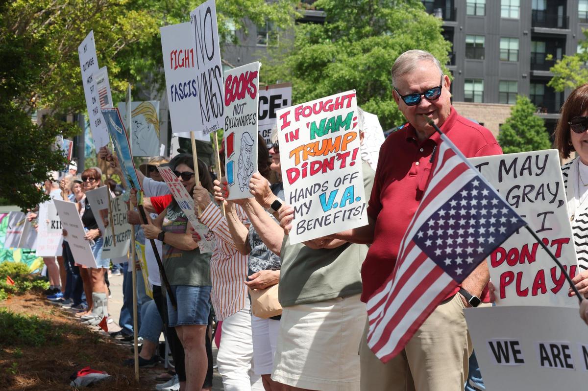 Hundreds of demonstrators gather in downtown Rock Hill Saturday for the York County Rising protest.