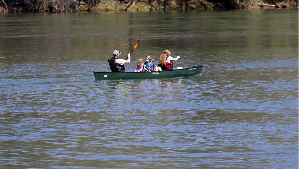 A family take a leisurely canoe tour of the Catawba River in Rock Hill March 31, 2018.