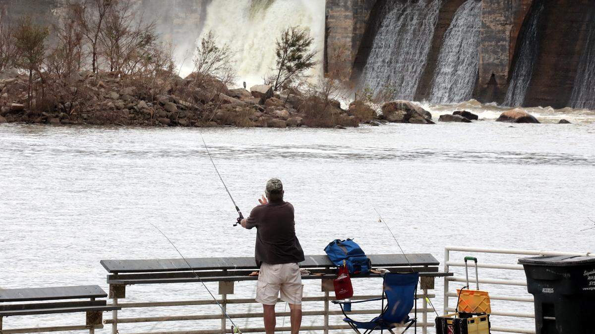 Bob Ginther of Tega Cay fishes Wednesday at the Lake Wylie dam.
