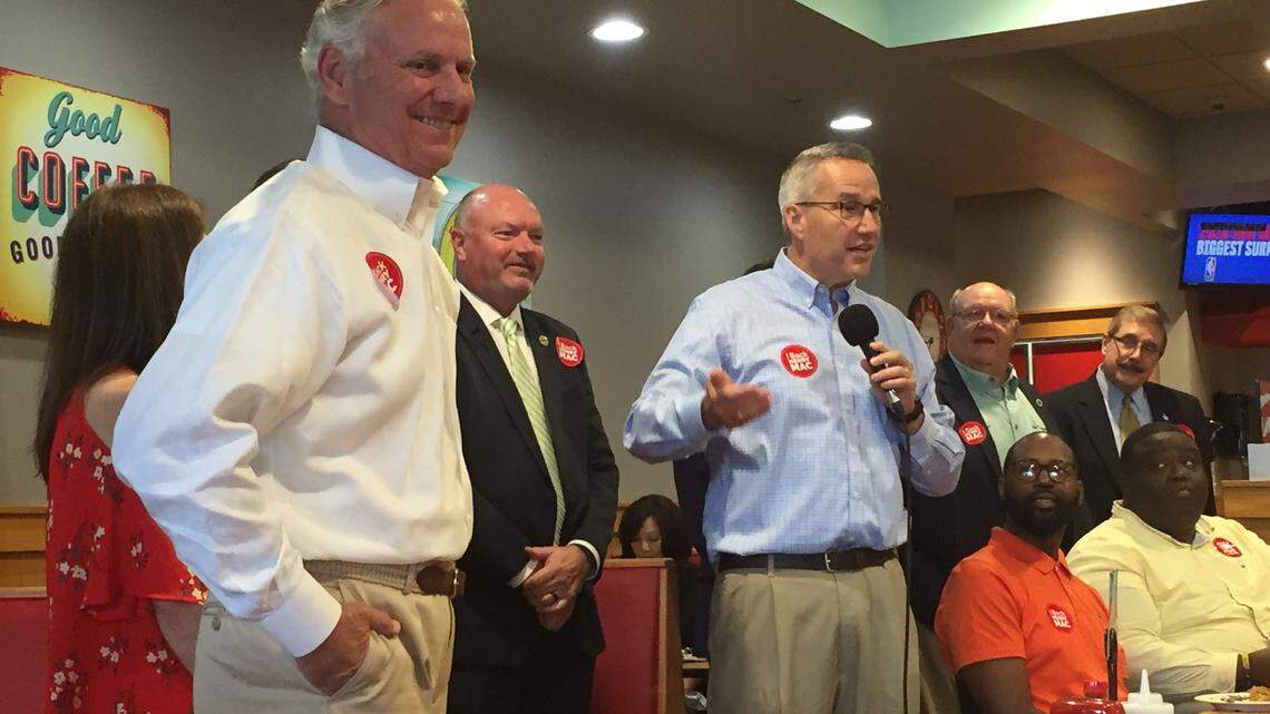 Rep. Tommy Pope (R-York), right, backed Gov. McMaster, left, at a campaign stop in Rock Hill Friday.