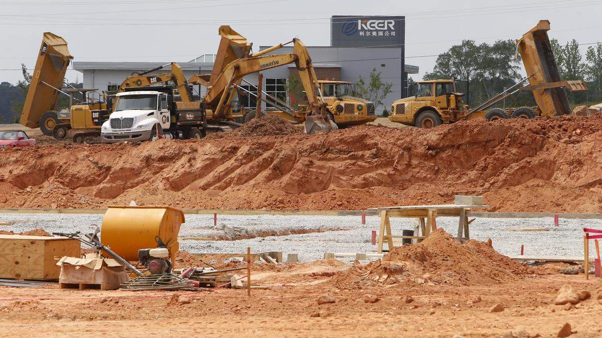 Development in Indian Land.  Parked construction equipment  at the Bailes Ridge Corporate Park on SC 160 East at Old Bailes Road Friday. In the background is the Keer America yarn factory.