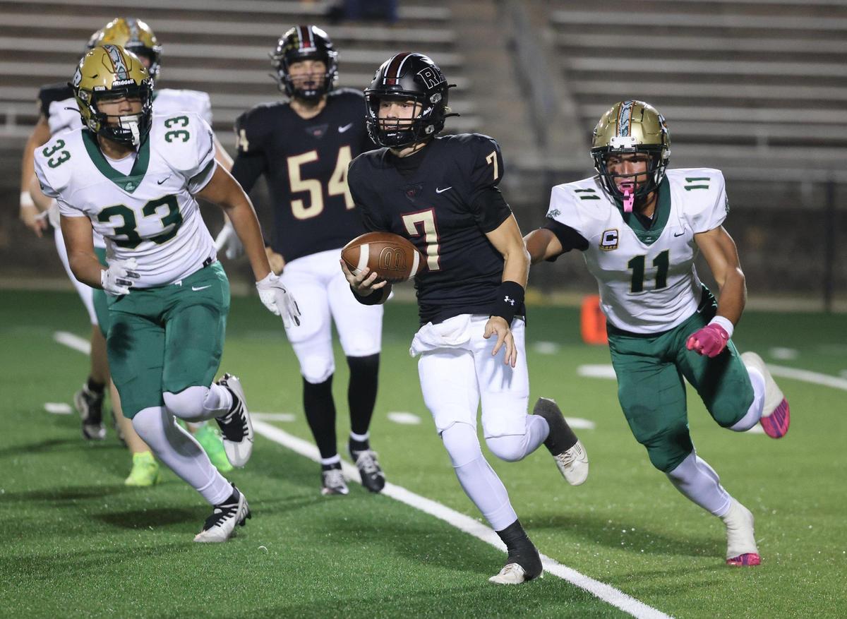 Rock Hill’s Ian Grissom carries the ball