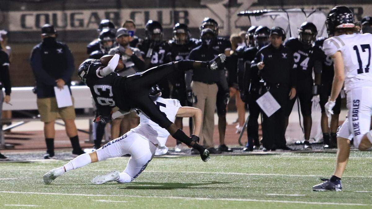 York’s Javon Long gets tackled by a Clover defender in the latest iteration of the oldest rivalry in South Carolina.