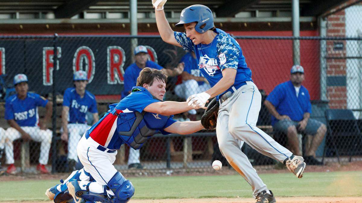 Fort Mill’s #9 Carson Jones avoids the tag at home plate to add to the Fort Mill lead as Fort Mill Post 43 demolishes Lancaster Post 31 14-0 in American Legion baseball action Monday night, 6-17-2019.