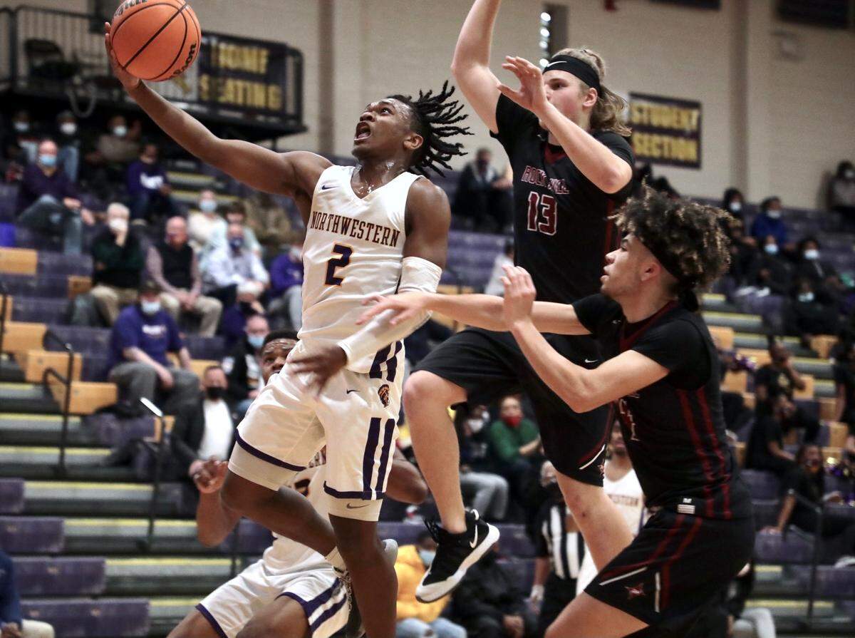 Northwestern senior guard AJ Thompson goes up for a layup on Senior Night against Rock Hill on Wednesday.