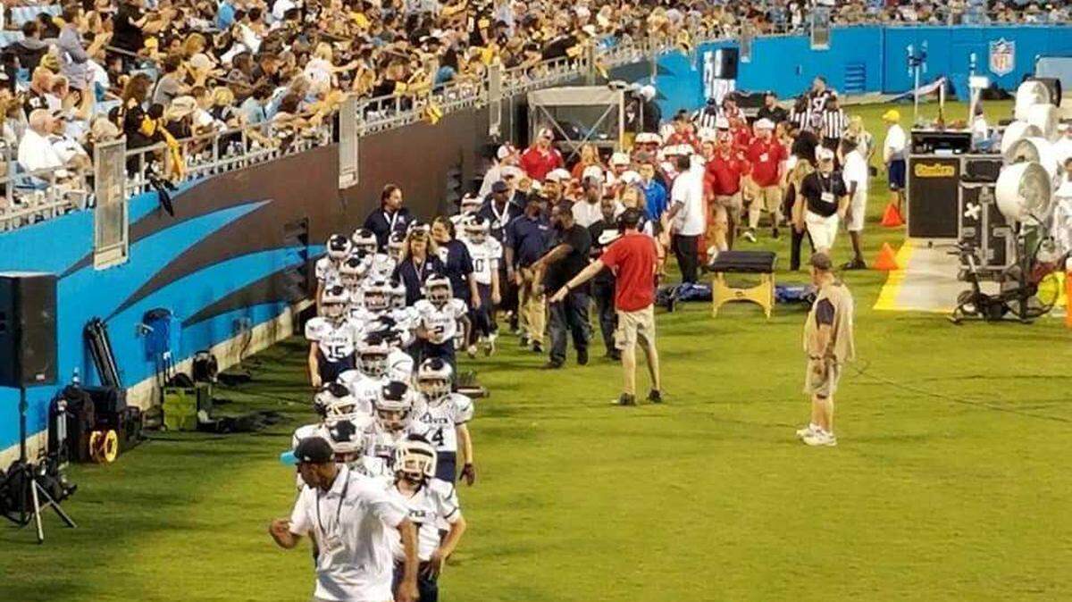 The Clover Blue Eagles stream into Bank of America Stadium in Charlotte to play at halftime of the Carolina Panthers’ fourth preseason game on Thursday night. Photo provided by Joe Mayberry, from his organization’s Facebook page.