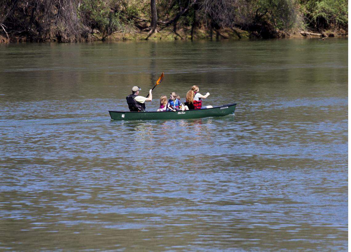 A family take a leisurely canoe tour of the Catawba River in Rock Hill.