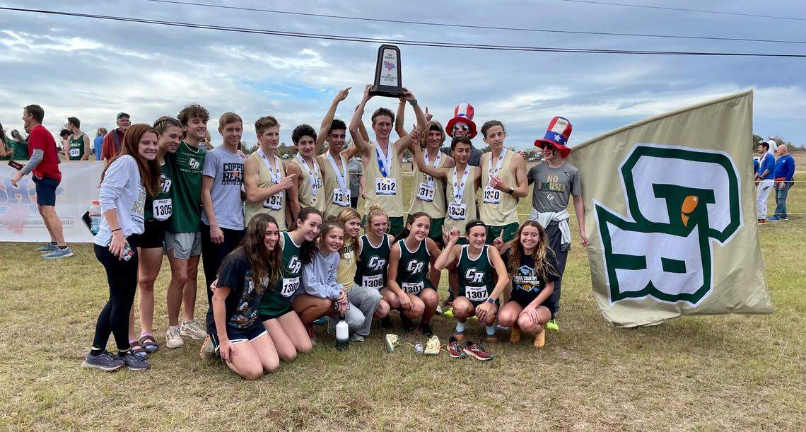 The Catawba Ridge cross country team poses for a team picture at the state championships in Columbia on Thursday. The boys took home second place; the girls finished sixth.