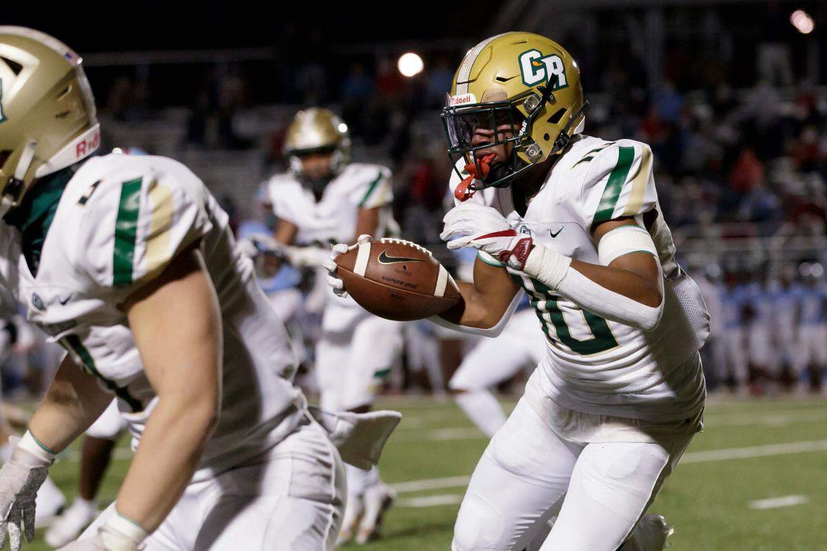 Catawba Ridge’s #10 Jacobie Henderson carries the ball in first half play as AC Flora hosts Catawba Ridge in a semifinal matchup of the 2020 SCHSL Football State Championships. 11-27-2020.
