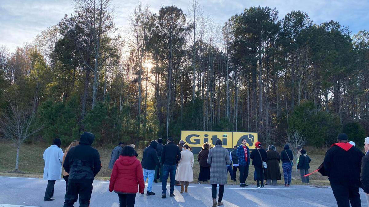 A group of about 40 people approached Giti Tire’s manufacturing plant in Richburg to deliver a letter demanding fair treatment of workers.