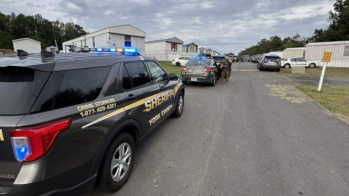 York County Sheriff’s Office deputies near mobile homes near Rock Hill, South Carolina where one person was shot Sept. 25, 2024, officials said.