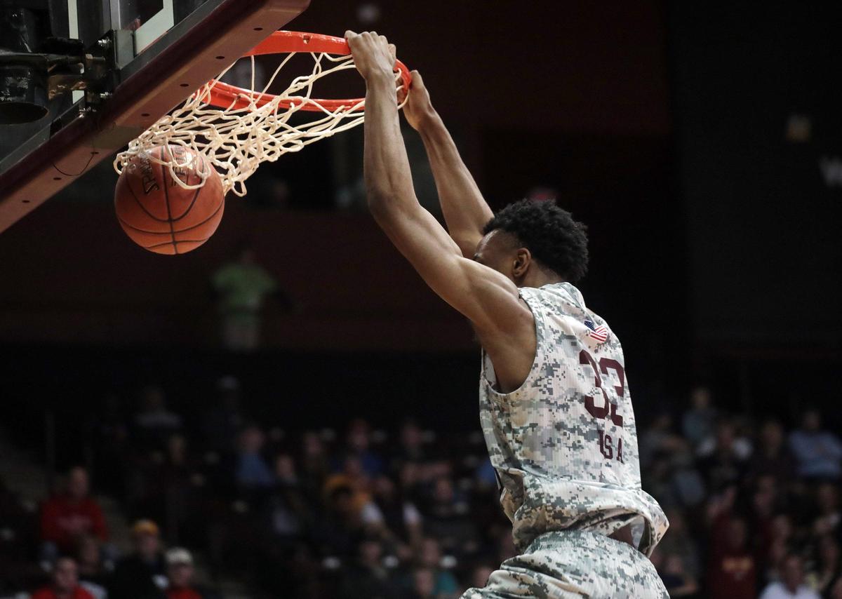 Winthrop’s Chase Claxton dunks the ball Saturday, Feb. 1, 2020 at the Winthrop Coliseum in Rock Hill, S.C.