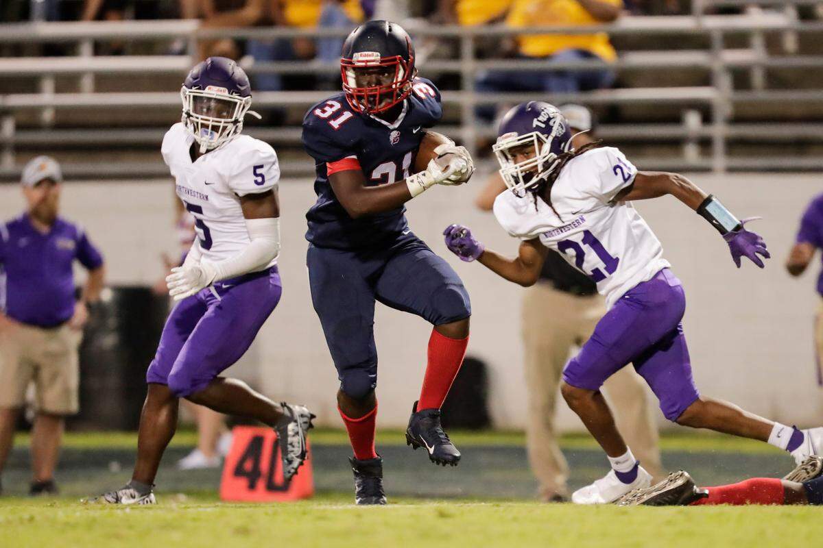 Chester’s (31) Shydem McCullough spins past a defender in first half play as Chester hosts Northwestern in Friday night football 9-10-2021. The Cyclones take on Belton-Honea Path in the first round of the 3A playoffs on Friday (Nov. 5).