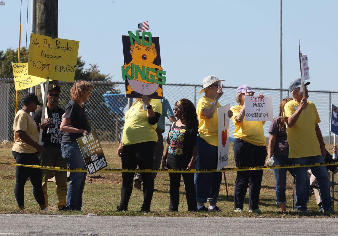 Hundreds of Indian Land and Fort Mill residents gathered across the street from Indian Land Middle School on Saturday, Oct. 18, as part of the national ‘No Kings’ protests against President Donald Trump.