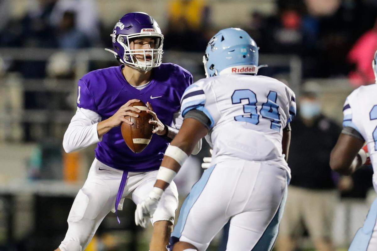 Herald file: Northwestern’s #1 Will Mattison looks down field for the receiver as Northwestern hosts Dorman in second round action of the State 5A football playoffs. 11-13-2020. Mattison is a key piece for the Trojans returning in 2021.