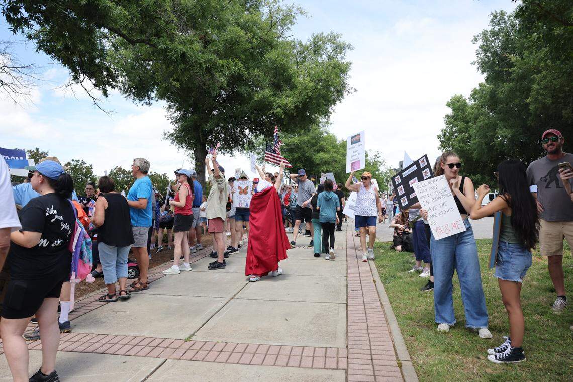 Hundreds of people gathered Saturday, June 14,, 2025 in downtown Rock Hill to protest the Trump administration.