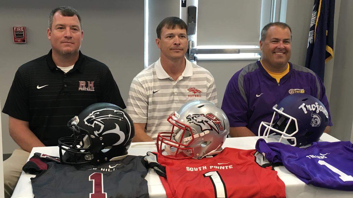 Rock Hill High football coach Bubba Pittman, Northwestern coach James Martin and South Pointe coach Strait Herron attended the May 15, 2018 WRHI Football City USA Kickoff scrimmage announcement in Rock Hill. Rock Hill High will face Myers Park, Northwestern will play Providence and South Pointe will play Byrnes at District Three Stadium on Aug. 10.