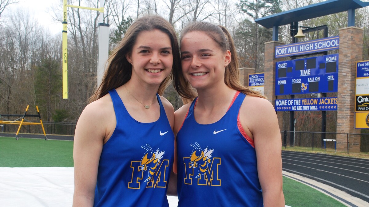 Track and field athletes Jessica, left, and Anna Brewer recently signed with Clemson University after switching their commitment from the College of Charleston. The recent Fort Mill High School graduates were already well regarded, but their stock rose during the S.C. 5A Championships.