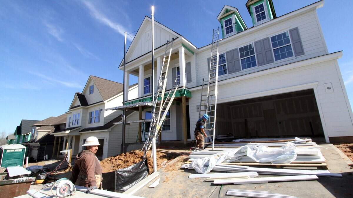A construction crew works on a newly built home in the Brayden community in Fort Mill back in 2016. 