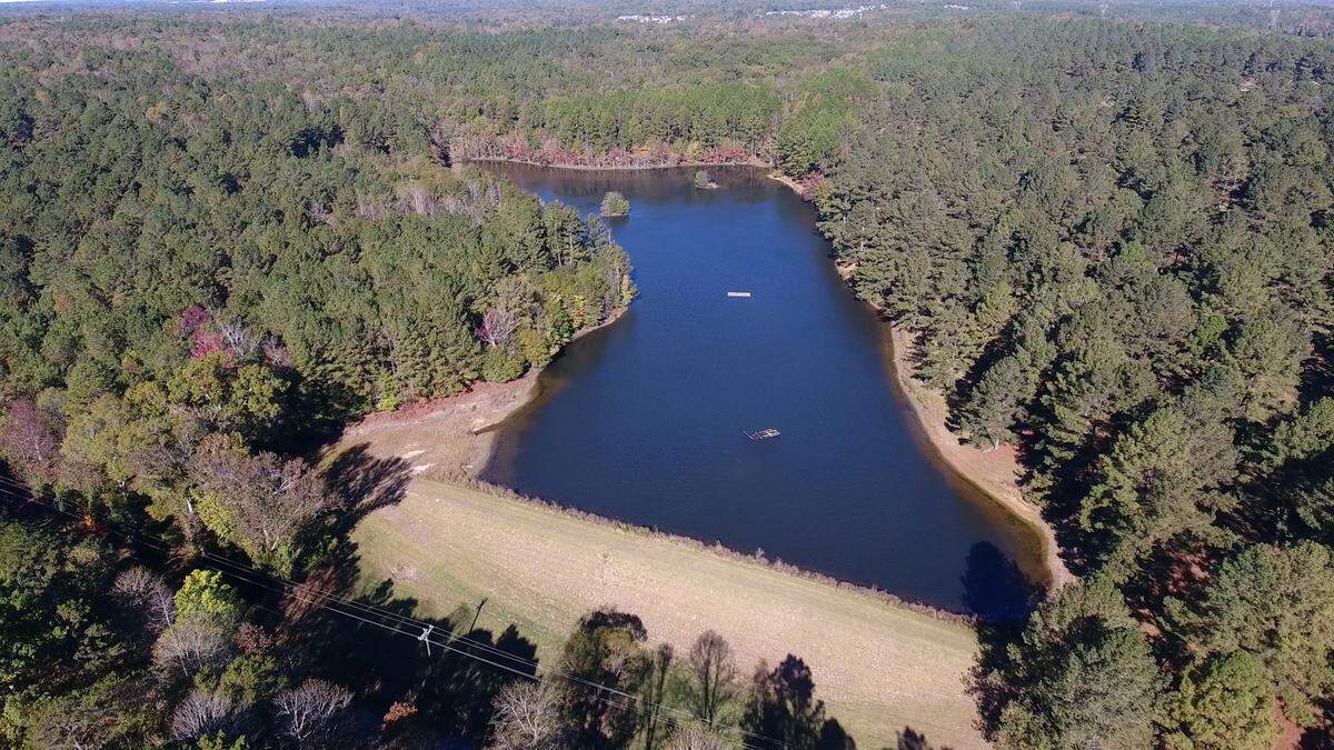 Once construction is done, picnic tables and the disc golf course will be near the Catawba Bend Preserve park’s big pond. 