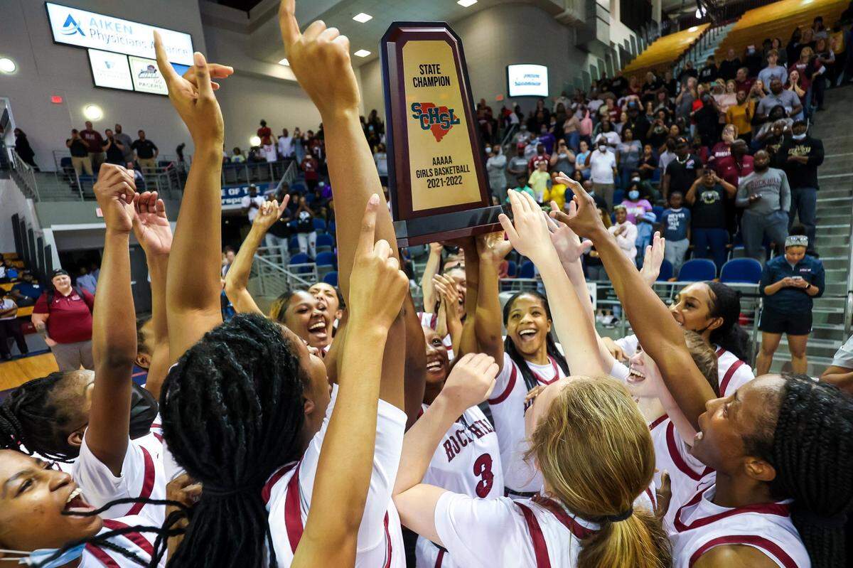 Rock Hill Bearcats players celebrate after winning the Girls 5A State Championship Game at the University of South Carolina Aiken Thursday, March 3, 2022.