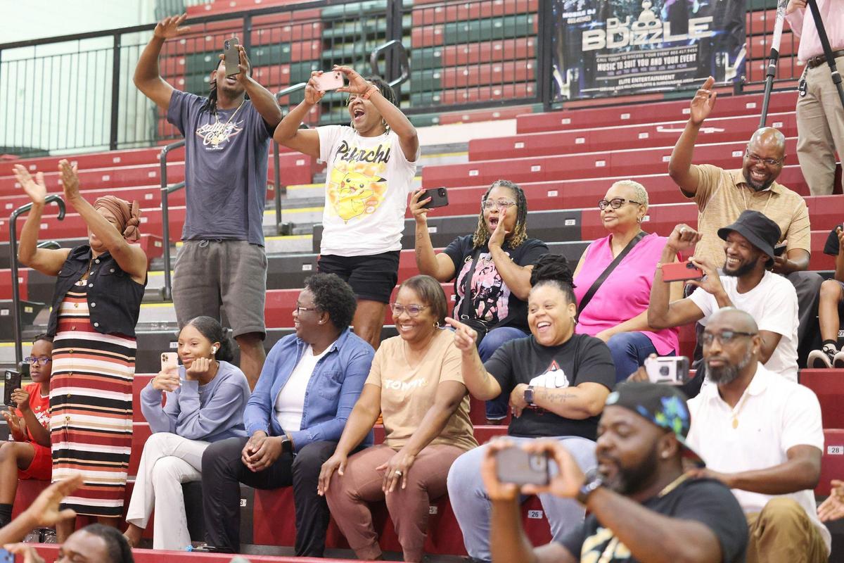 Friends and family cheer for Malik Clark, a wide receiver at Rock Hill High School, as the senior signed to play for Florida State University on Wednesday.