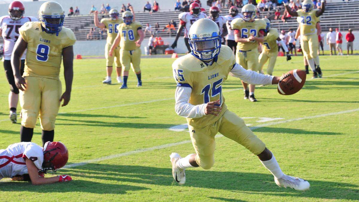 Lewisville senior defensive back/running back Ja’shawn Jason puts the first points of the night on the board at the Chester jamboree. Jason’s score in the second of two twelve minute halves against Great Falls was followed by Martez Moore’s touchdown.
