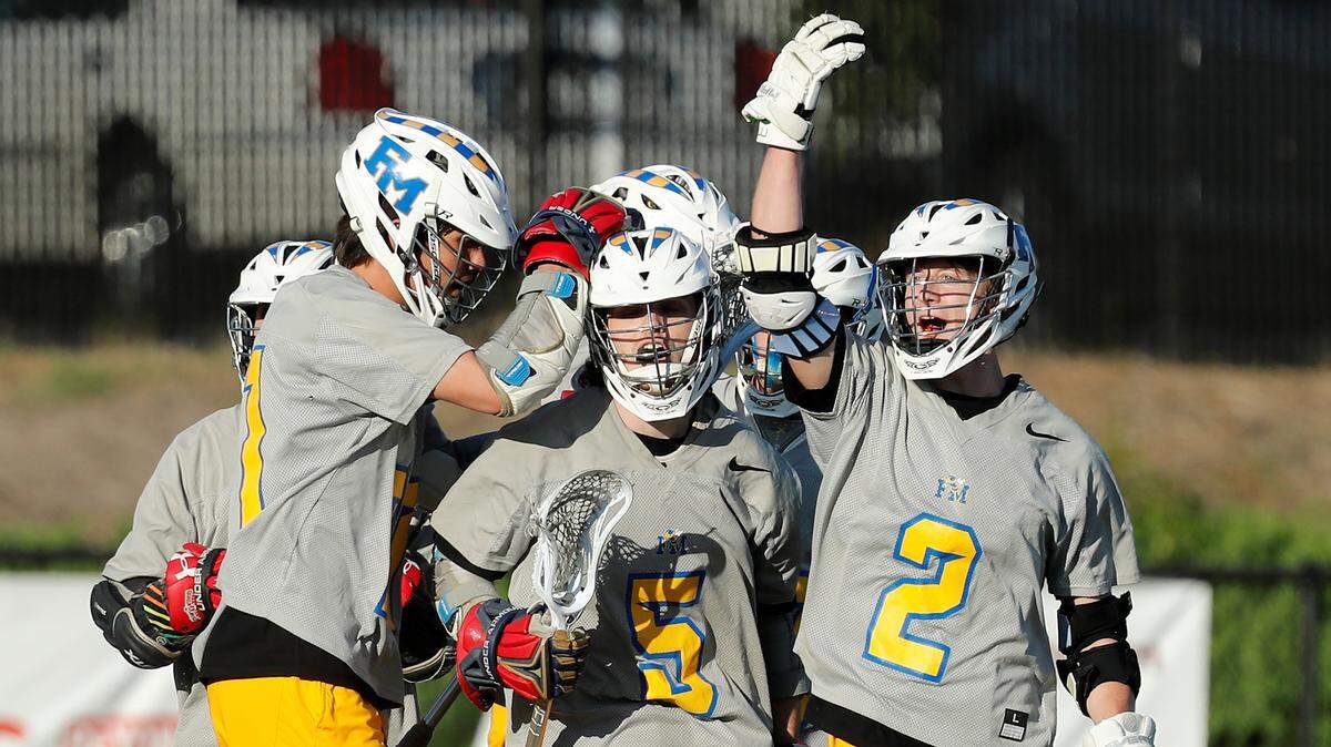 Fort Mill’s #2 Trenton Wylie celebrates a goal as Fort Mill captures the title with a 13-8 win against Wando in the South Carolina High School League boys 5A Lacrosse Championship Game Saturday, 4-27-2019.