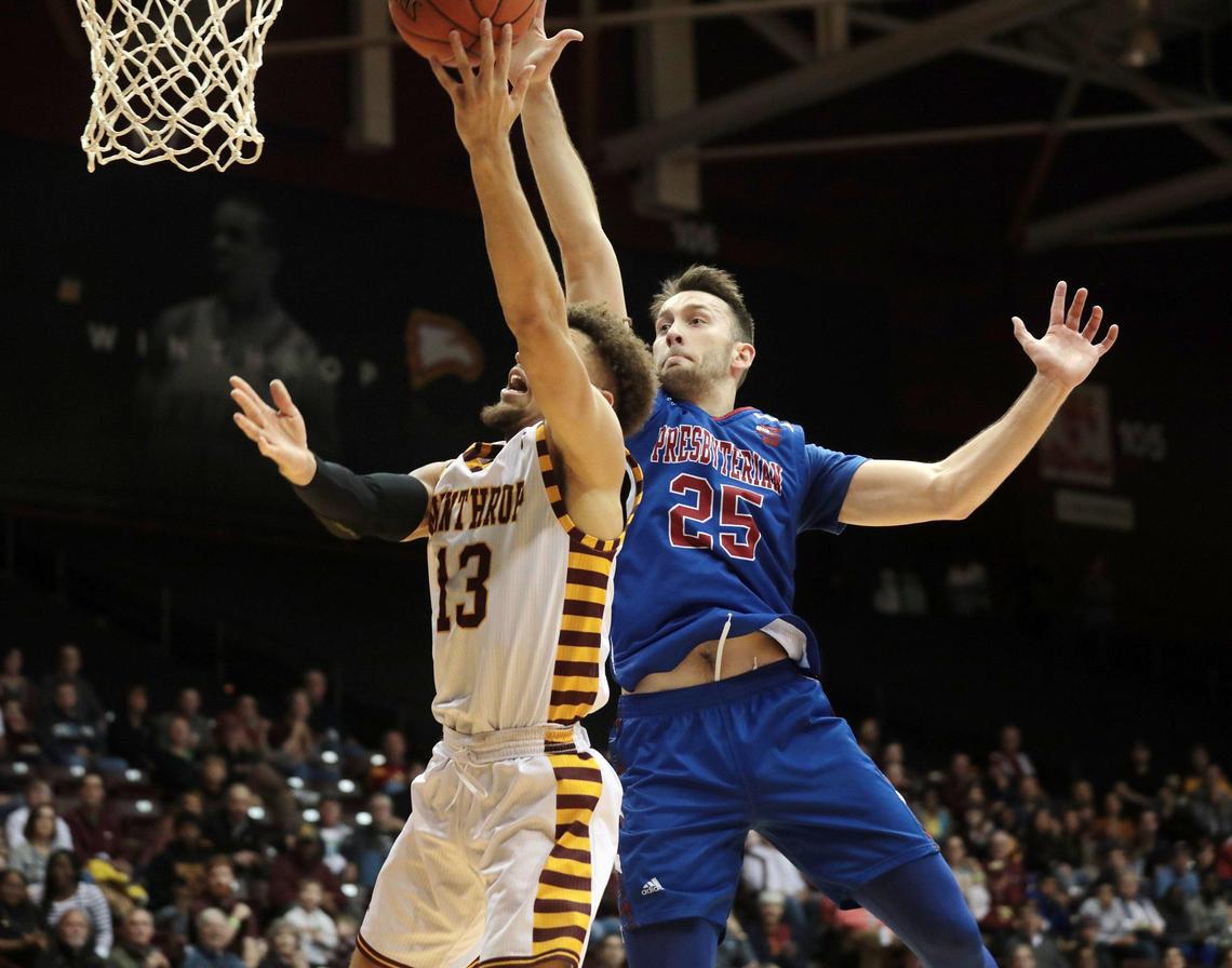 Winthrop’s Hunter Hale heads for the basket as Presbyterian’s J.C. Younger tries to block the shot. The Eagles hosted the Blue Hose Saturday, Jan. 25, 2020 in Rock Hill, S.C.